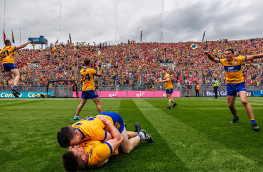 John Conlon and Tony Kelly celebrate