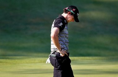 A young Rory McIlroy leaves Augusta National after 2011 collapse